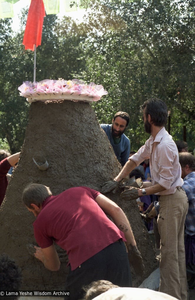 (05798_ng-3.jpg) Sealing the cremation stupa of Lama Yeshe, Vajrapani Institute, California, 1984. Chuck Thomas, John Jackson, and Steve Malasky (Pearl) in photo. Åge Delbanco (photographer)