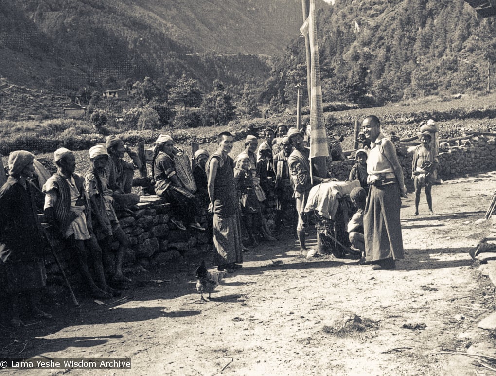 (07651_pr-2.psd) Lama Yeshe on the road to  Lawudo Retreat Centre, Nepal, 1973. Lama Zopa Rinpoche is in the center of this photo.