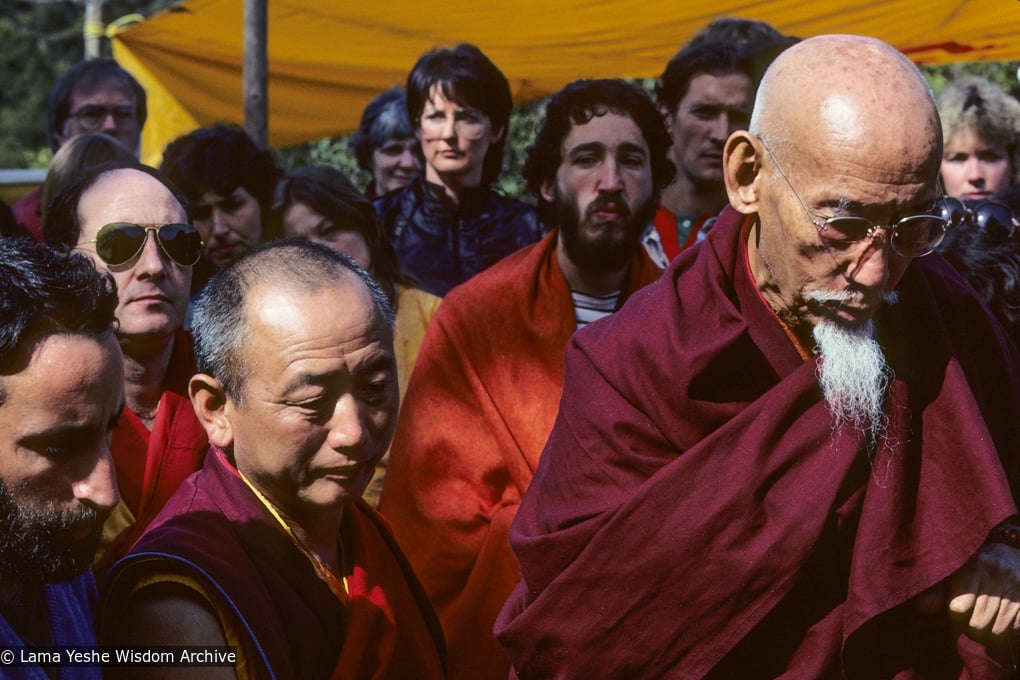 (10041_sl-3.JPG) Chuck Thomas, Nick Ribush, Geshe Lobsang Gyatso with Zong Rinpoche at the cremation of Lama Yeshe, Vajrapani Institute, California, 1984. Ricardo de Aratanha (photographer)