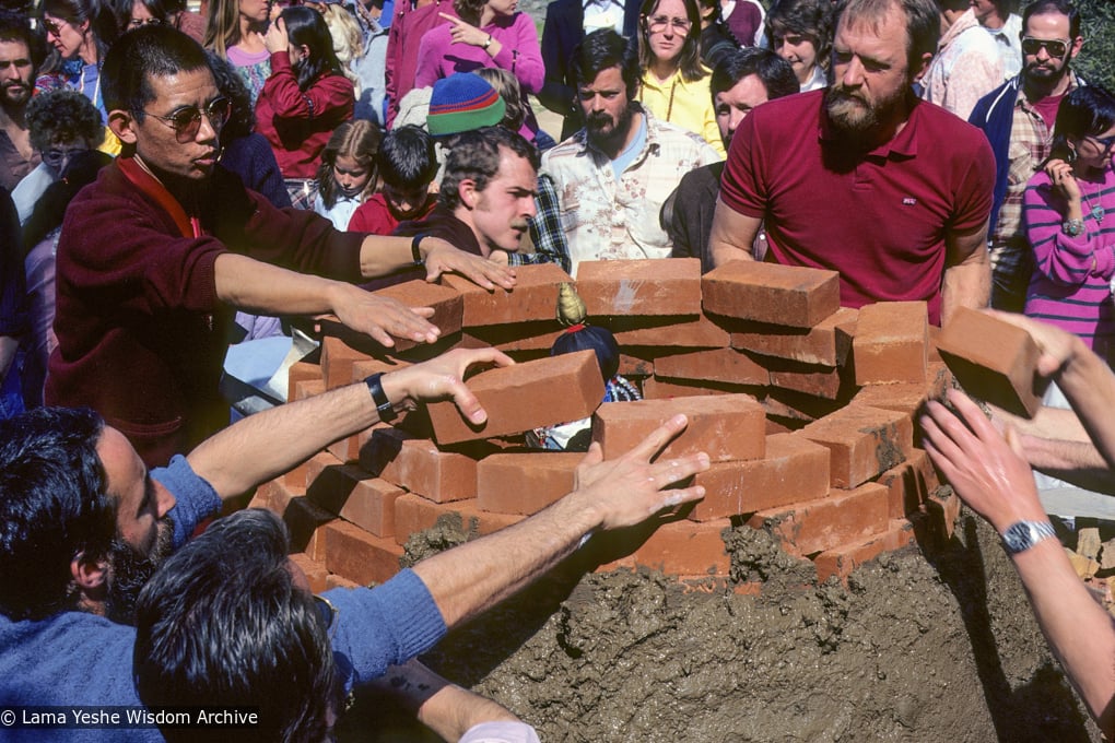 (10051_sl-3.JPG) Sealing the cremation stupa of Lama Yeshe, Vajrapani Institute, California, 1984. Photo includes Tenzin Wangchuk, John Jackson, Bill Kane, and Chuck Thomas. Ricardo de Aratanha (photographer)