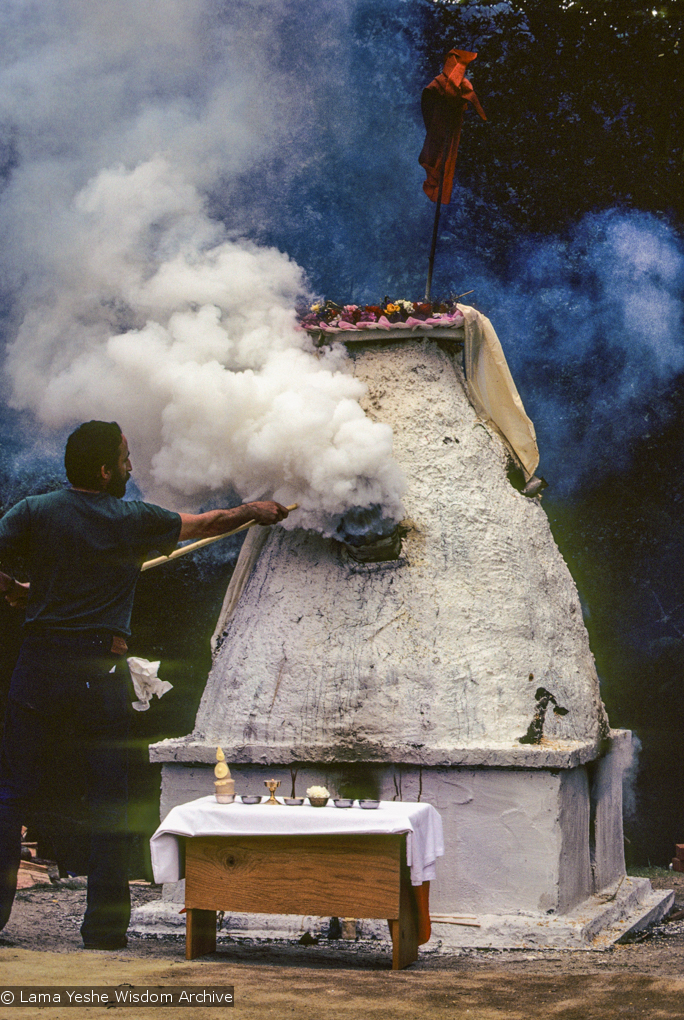 (10121_sl.JPG) Chuck Thomas tending the fire. Cremation of Lama Yeshe at Vajrapani Institute, California in March of 1984. Photo by Ricardo de Aratanha.