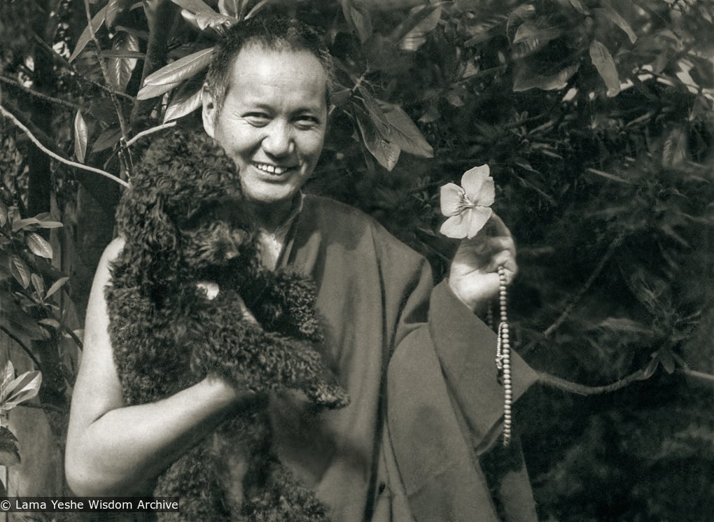 (10524_pr-3.tif) Lama Yeshe and Bobik in Beatrice Ribush's back yard, Melbourne, AU,1974. Photo by Dorian Ribush.