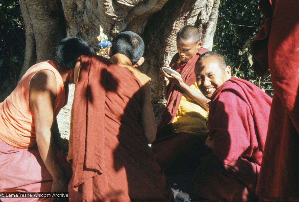 (12925_sl.tif) Lama Yeshe painting Tara, Kopan Monastery, Nepal, 1976. Lama Yeshe sent Max Mathews to buy a large Tara statue in Kathmandu, which was eventually placed in a glass-fronted house on a pedestal overlooking a triangular pond that was built under the ancient bodhi tree in front of the gompa, Kopan Monastery, Nepal. Photo by Peter Iseli.