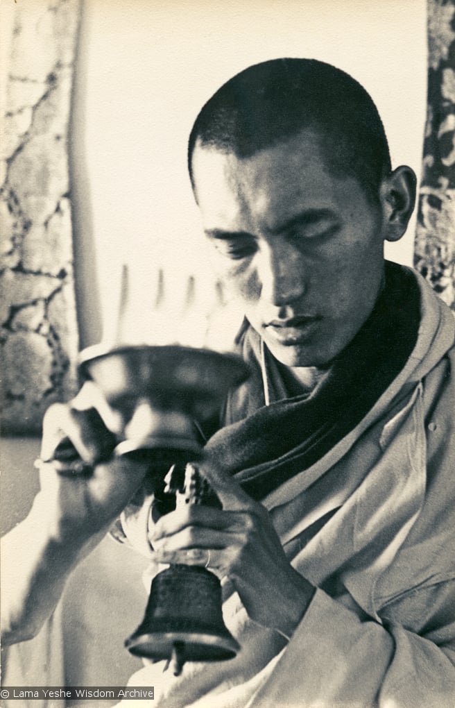 (13301_pr-2.psd) Lama Zopa Rinpoche doing puja (spiritual practice) during the Fourth Meditation Course, Kopan Monastery, Nepal, 1973. Photo by Brian Beresford.