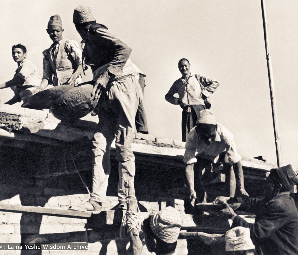 (15044_pr.jpg) Lama Yeshe on the roof acting as foreman and supervising the construction of Kopan, 1972. Kopan Monastery, built in Nepal, is the first major teaching center founded by Lama Yeshe and Lama Zopa Rinpoche.