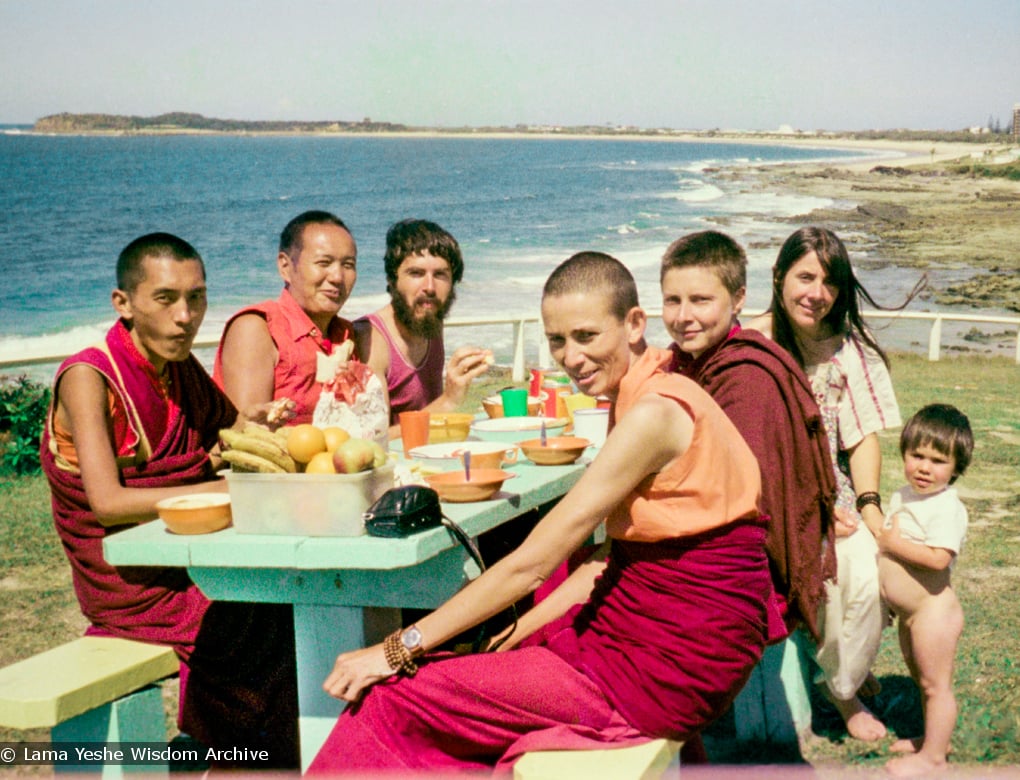 (15853_ng.tif) Group photo by the ocean, Maroochydore, Australia, 1974. The lamas took a day off during the Diamond Valley course to go to the beach in Tom Vichta's van. Everyone got out to enjoy the view from the cliffs, but Lama Yeshe ran straight down to the water's edge, hitched up his robes, and waded in, splashing about with delight.