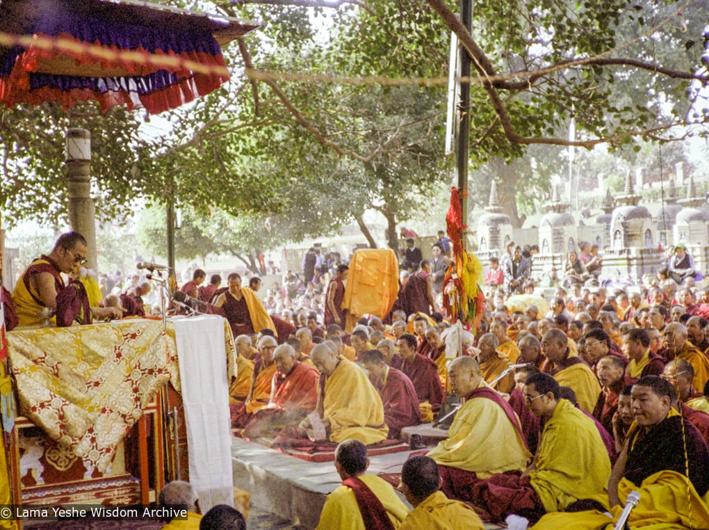 (16210_ng-3.TIF) H.H. 14th Dalai Lama teaching under the Bodhi Tree, Bodhgaya, 1982. Dan Laine (photographer)