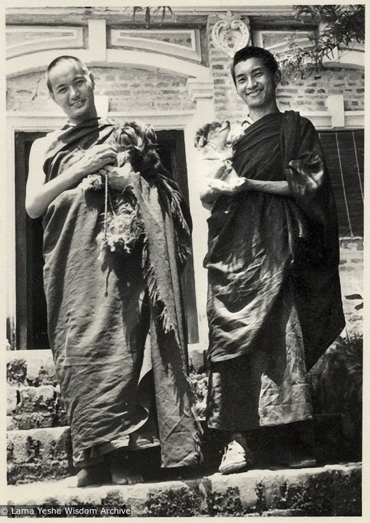 Lama Yeshe and Lama Zopa Rinpoche on the steps of the old house at Kopan Monastery, possibly 1969.