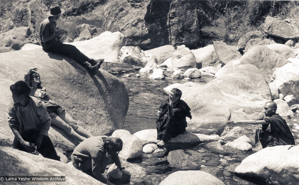 (34019_ud-1.psd) The treking party stops by a river in Kusum on the way to Phagding (half way between Lukla and Namche in Nepal). The party included Lama Yeshe, Lama Zopa Rinpoche, Max Mathews, Zina Rachevsky, Jacqueline Fagan (a New Zealander who had been at Villa Altomont), Judy Weitzner and her husband, Chip Cobalt. Photo donated by Judy Weitzner.