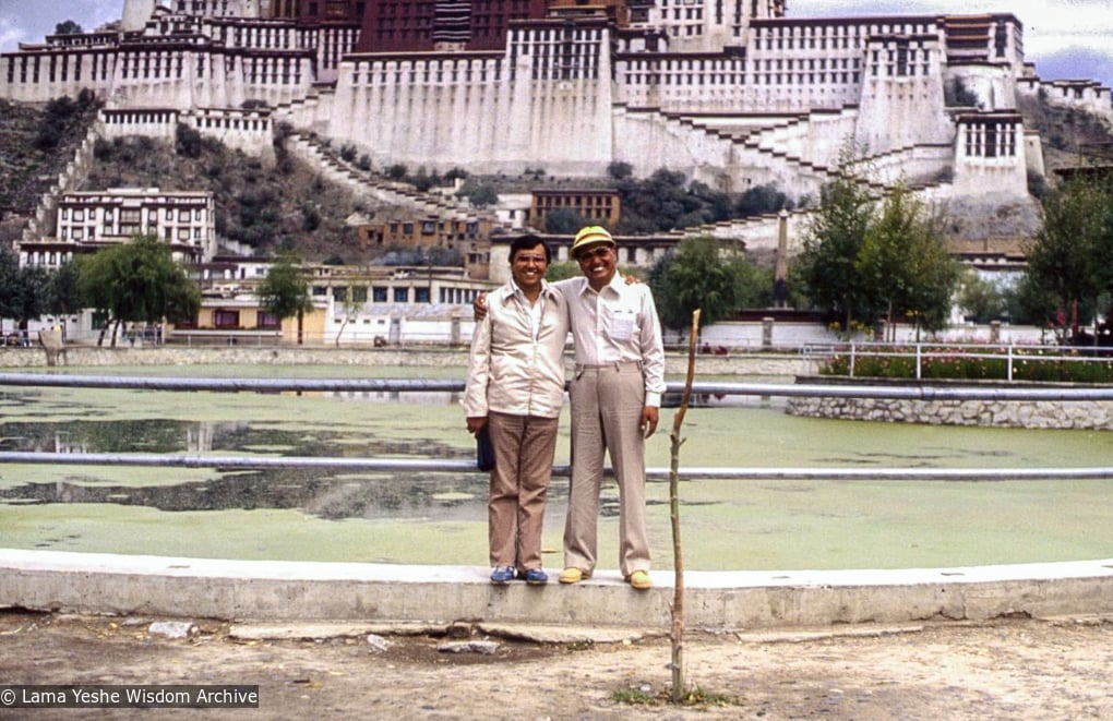 (39514_ud-3.jpg) Lama Yeshe with Sharpa Tulku in front of the Potala Palace, Lhasa, Tibet, 1982. Wisdom Publications (donor)