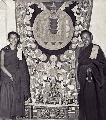Click to view in our Image Gallery Lama Zopa Rinpoche and Lama Yeshe with a mandala applique thangka, Kopan Monastery, 1970.