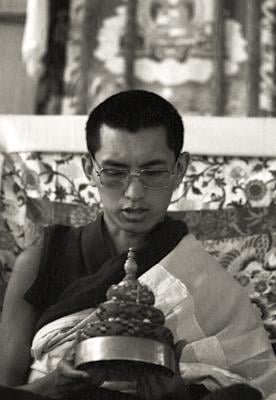 Lama Zopa Rinpoche doing mandala offering during the 9th Meditation Course, Kopan Monastery, Nepal, 1976.