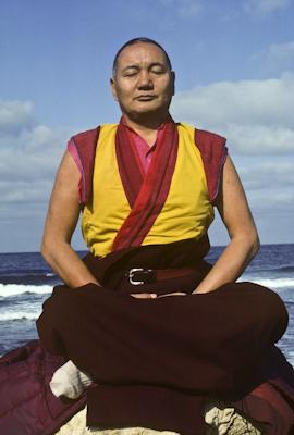Click to view in our Image Gallery Lama Yeshe meditating by the ocean, Sicily, 1983. Photo: Jacie Keeley.