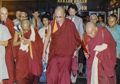 Lama Yeshe and Lama Zopa Rinpoche with His Holiness the Dalai Lama at the Third Dharma Celebration, Oberoi Hotel, New Delhi, India, 1983. Photo: Bill Kane