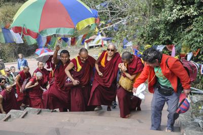 Kyabje Lama Zopa Rinpoche ascends Vulture's Peak, Rajgir, 12 March 2014. Photo by Thubten Jangchub.