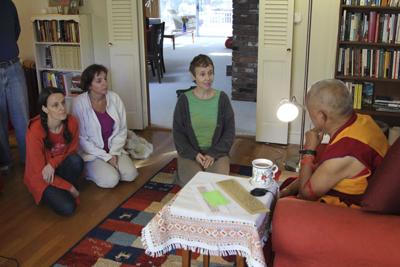 Lama Zopa Rinpoche with Mer Stafford, Jen Barlow and Wendy Cook at LYWA office, Lincoln, MA, October 2012.