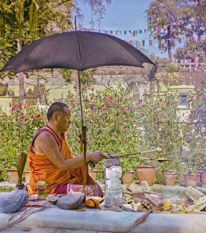 Lama Yeshe performing a fire puja at the stupa, Bodhgaya, India, 1982. Photo: Dan Laine.