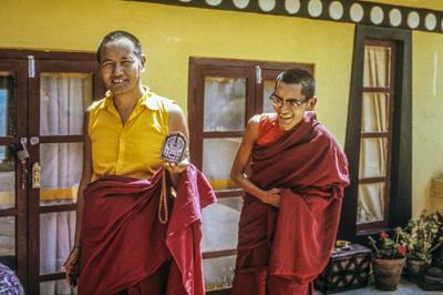 Lama Yeshe and Lama Zopa Rinpoche making Chenrezig tsa tsas on the rooftop terrace at Kopan Monastery, Nepal, 1973.