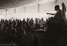 (10456_pr-2.psd) Lama Yeshe teaching in the tent, Kopan Monastery, Nepal, 1974. For the Seventh Meditation Course a huge Indian wedding tent replaced the dusty burlap-walled tent.