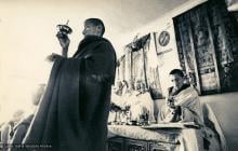 (13303_pr-2.psd) Lama Zopa Rinpoche doing puja (spiritual practice) during the Fourth Meditation Course, Kopan Monastery, Nepal, 1973. Photo by Brian Beresford.