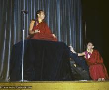 Lama Yeshe giving a public talk (with Nick Ribush at the right), Melbourne University, Australia, 1975.