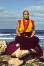 Lama Yeshe meditating by the ocean, Sicily, 1983. (Photo Jacie Keeley)