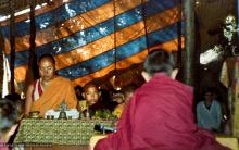 (15597_pr-2.psd) Lama Yeshe doing puja. Next to Lama Yeshe is Gelek Gyatso. Photo from the 8th Meditation Course at Kopan Monastery, Nepal, 1975.