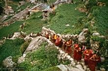 (15867_sl.psd) Mount Everest Center monks climbing up to Namche Bazaar, Nepal, 1974.