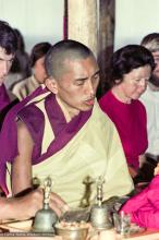 (15918_ng.tif) Lama Zopa Rinpoche doing puja, 1975. From the collection of images of Lama Yeshe, Lama Zopa Rinpoche and the Sangha during a month-long course at Chenrezig Institute, Australia. Beatrice Ribush is on the right.