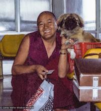 (22238_ng-3.psd) Lama Yeshe with his dog, Yeshe Senge at Tribhuvan Airport, Nepal, 1982.