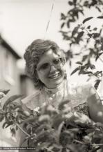 (25275_ng-3.TIF) Jacie Keeley at a teaching with Lama Zopa Rinpoche outdoors at Manjushri London (currently Jamyang Buddhist Centre), 1983. Robin Bath (photographer)