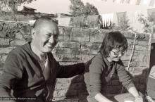 (39324_ng-3.tif) Lama Yeshe with Jampa Trinley's daughter, Tsen-la Tuladhar, Kopan Monastery, 1978.