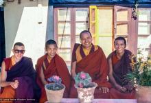 (20_120.tif) Roger Wheeler, Lama Lhundrup, Lama Yeshe and an unknown monk on the gompa terrace, Kopan Monastery, Nepal, 1982.