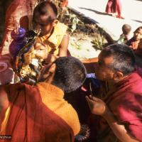 (06479_sl.JPG) Lama Yeshe painting Tara, Kopan Monastery, Nepal, 1976. Lama Yeshe sent Max Mathews to buy a large Tara statue in Kathmandu, which was eventually placed in a glass-fronted house on a pedestal overlooking a triangular pond that was built under the ancient bodhi tree in front of the gompa, Kopan Monastery, Nepal. Photo by Peter Iseli.