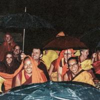 (06965_pr-3.psd) Lamas with sangha and students doing puja in the rain, Bodhgaya, India, 1982.