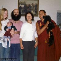 (07645_pr-2.psd) Lama Yeshe with the Ribush family, 1975. From left: Alison Ribush holding Kalu, Dorian Ribush, Beatrice Ribush and Lama Yeshe holding Bobik. Melbourne, Australia, 1975. Photo by Nick Ribush.