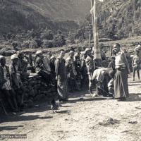 (07651_pr-2.psd) Lama Yeshe on the road to  Lawudo Retreat Centre, Nepal, 1973. Lama Zopa Rinpoche is in the center of this photo.