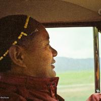 (08315_ng-3.psd) Lama Yeshe driving to Reno with Anila Ann and  John Feuille, 1980.