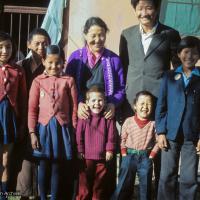 (09626_sl.JPG) Jampa Trinley with his wife, Ngawang, their family and Daja Meston (Thubten Wangchuk) in the front, at their house in Kathmandu, Nepal, 1975. Front row, left to right: Wangmo, Daja Meston (Thubten Wangchuk), Tsewang, Tashi. Back row, left to right: Nyidro, Auntie Tham Chola, Ngawang, Jampa Trinley.   Kelsang Puntsog Rinpoche, the son of Lama Yeshe's old friend Jampa Trinley, was later recognized to be the reincarnation of Geshe Ngawang Gendun, one of Lama's teachers.