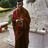 (09988_sl-3.psd) Lama Zopa Rinpoche at the cremation stupa of Lama Yeshe, Vajrapani Institute, California, 1984. Ricardo de Aratanha (photographer)