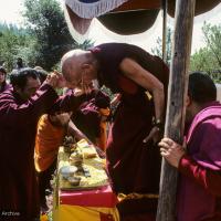 Click to view in our Image Gallery (10064_sl.JPG) Zong Rinpoche attended to by Geshe Gyeltsen at the cremation of Lama Yeshe at Vajrapani Institute, California in March of 1984. Photo by Ricardo de Aratanha.