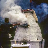 Click to view in our Image Gallery (10121_sl.JPG) Chuck Thomas tending the fire. Cremation of Lama Yeshe at Vajrapani Institute, California in March of 1984. Photo by Ricardo de Aratanha.