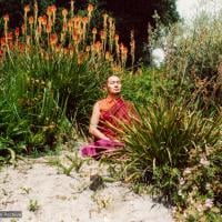 (12528_pr.jpg) Lama Yeshe meditating in the botanical gardens, Berkeley, California, 1974 Photo donated by Judy Weitzner.