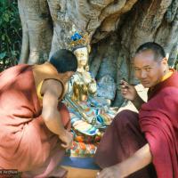 (12921_sl.tif) Lama Yeshe painting Tara, Kopan Monastery, Nepal, 1976. Lama Yeshe sent Max Mathews to buy a large Tara statue in Kathmandu, which was eventually placed in a glass-fronted house on a pedestal overlooking a triangular pond that was built under the ancient bodhi tree in front of the gompa, Kopan Monastery, Nepal. Photo by Peter Iseli.