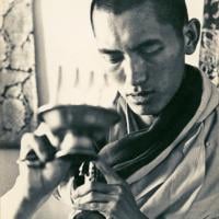 (13301_pr-2.psd) Lama Zopa Rinpoche doing puja (spiritual practice) during the Fourth Meditation Course, Kopan Monastery, Nepal, 1973. Photo by Brian Beresford.