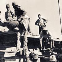 Click to view in our Image Gallery (15044_pr.jpg) Lama Yeshe on the roof acting as foreman and supervising the construction of Kopan, 1972. Kopan Monastery, built in Nepal, is the first major teaching center founded by Lama Yeshe and Lama Zopa Rinpoche.
