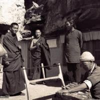 (15077_ng-1.psd) From the left: Tsultrim Allione, Lama Zopa Rinpoche, Lama Yeshe and Robert Sternfield with workers outside of the cave of the Lawudo Lama, Lawudo Retreat Centre, 1970. Photo by Terry Clifford.