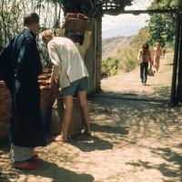 (15094_sl.tif) Construction at Kopan Monastery, Nepal, 1971, with students hauling bricks by the front gate to the Monastery. Zengo is to the left.