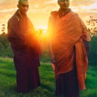 (15124_pr.psd) Lama Zopa Rinpoche and Lama Yeshe at dawn, Chenrezig Institute, Australia, 1975. Photo by Nick Ribush, taken on Saka Dawa at Chenrezig Institute, Australia, 1975. Restoration by David Zinn. Archival portrait available through Heart of the Moon Media (www.heartofthemoon.com).