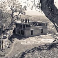 Click to view in our Image Gallery (15141_ng.psd) The construction of Kopan, second floor in progress, rear view, 1972. Kopan Monastery, built in Nepal, is the first major teaching center founded by Lama Yeshe and Lama Zopa Rinpoche.